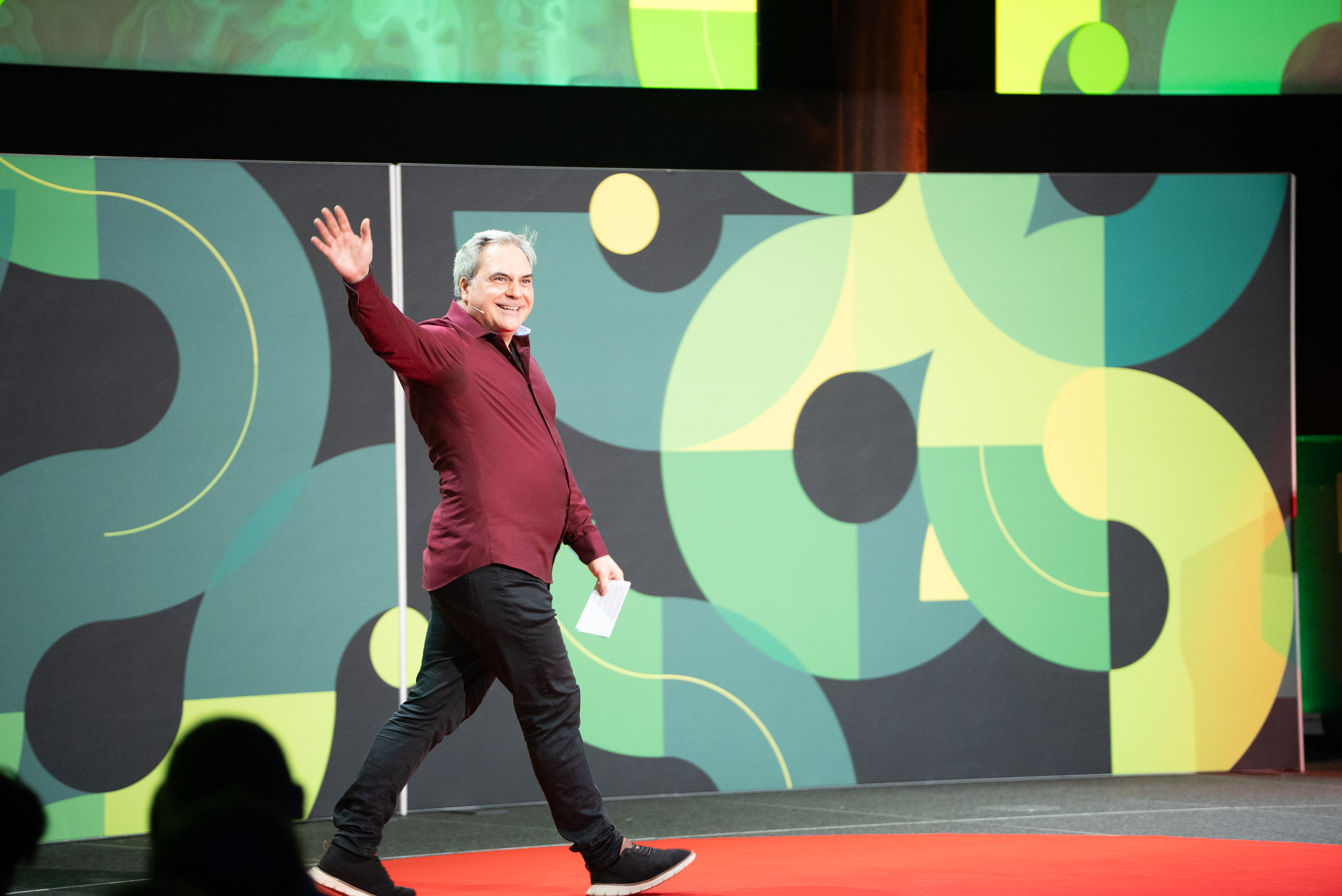 Damien on stage at TEDxLausanne 2025